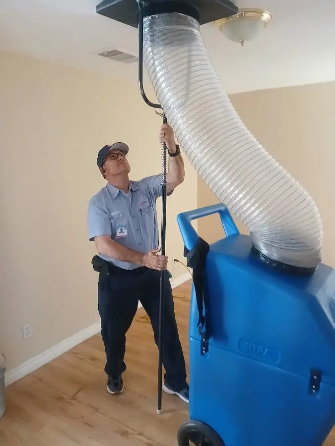 HVAC Installation technician using HEPA equipment in Orange
